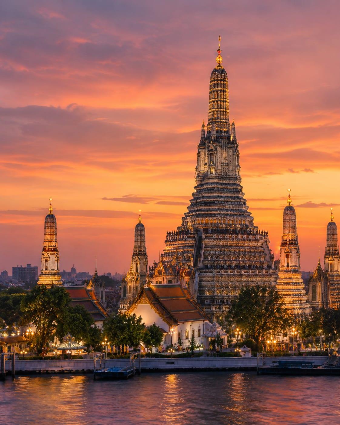 Wat Arun temple glowing at sunset
